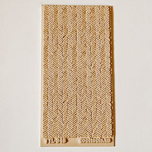 Smudged Herringbone Texture Tile